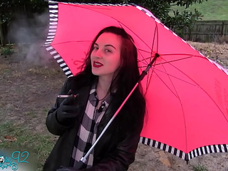 Leather Gloved Smoking In The Rain